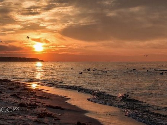 海边看夕阳浪漫诗句,海边余晖的唯美诗句